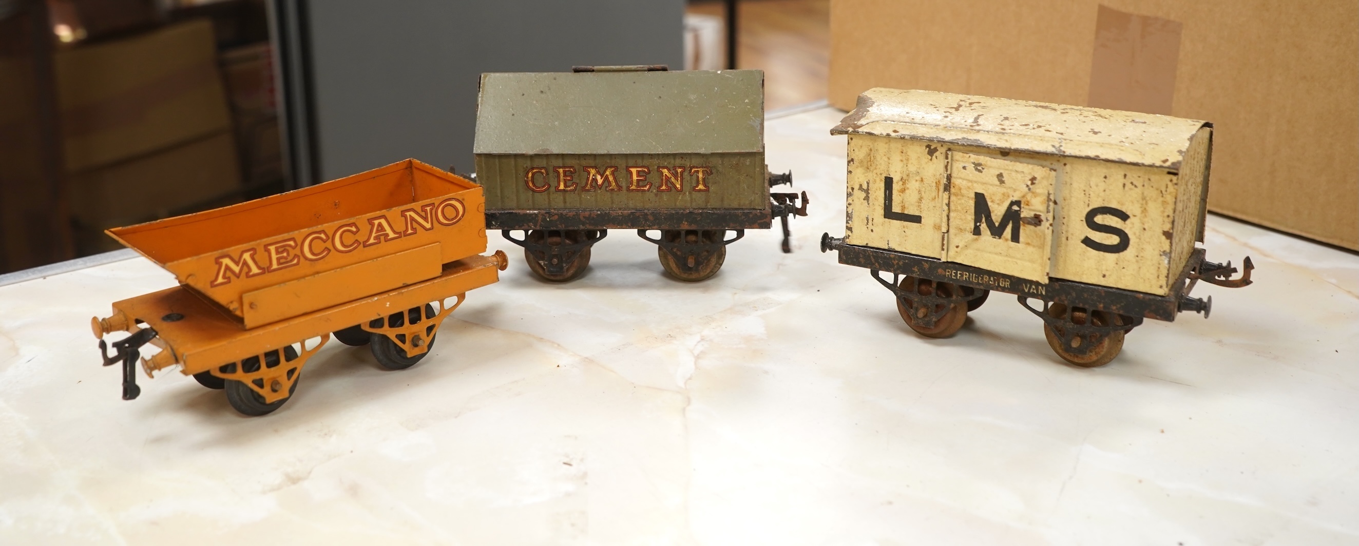 A Bing for Bassett Lowke 0 gauge tinplate clockwork LNER Ivatt 4-4-0 tender locomotive, 4390, together with an early Hornby clockwork 0-4-0, 2710, in GNR green livery with Meccano Ltd roundels to locomotive splasher and